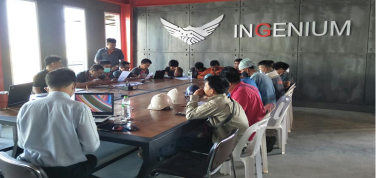INGENIUM team participating in an in-house safety briefing